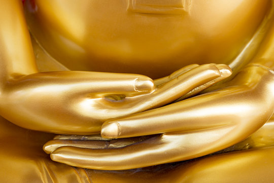 Hands of Golden Buddha statue