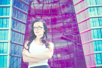 Business stylish woman near modern building