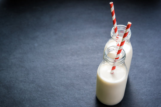 Traditional Vintage Milk Bottle With Striped Straw