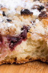 Grandmothers cake with cherries on the wooden board