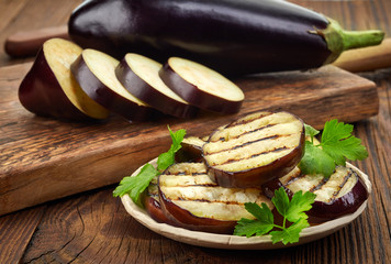 grilled eggplant on wooden table