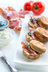 Mushroom burgers with jamon, cream cheese and mint sauce