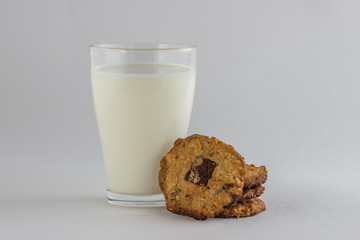 Glass of milk and oatmeal cookies