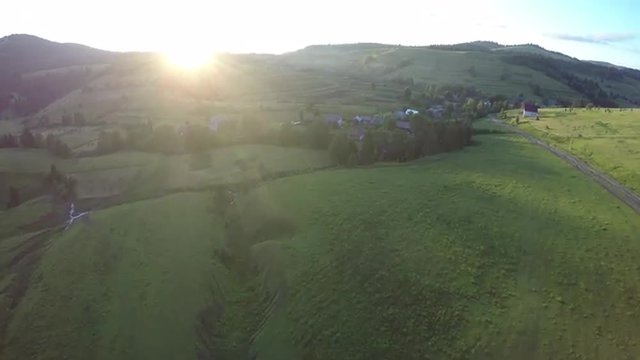 Sunrise at Carpathians village. Aerial view