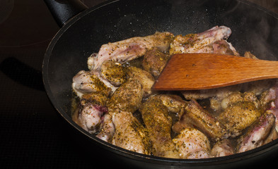 cooking food in frying pan
