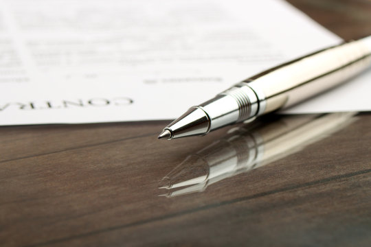 signing a contract, business contract details