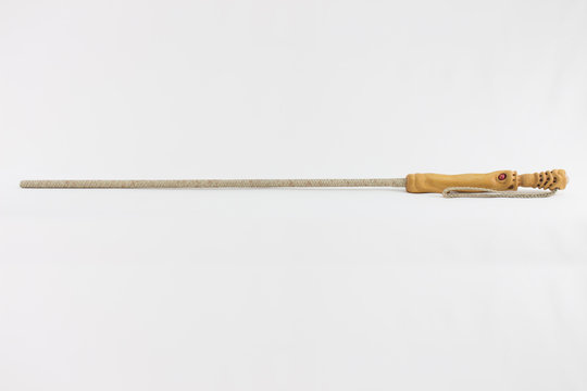 stack with carved wooden handle