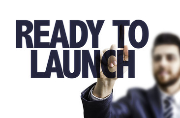 Business man pointing the text: Ready to Launch