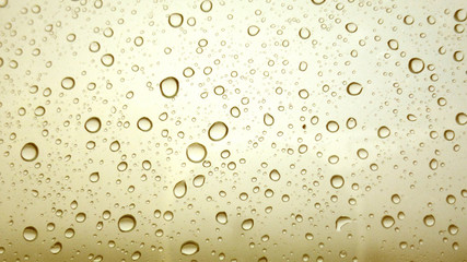 Close-up of water drops on glass surface as background