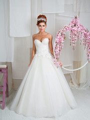 Fototapeta premium beautiful redheaded bride close-up make-up, jewelry, hairstyle