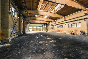 abandoned old industrial factory building in dark colors