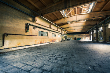 abandoned old industrial factory building in dark colors