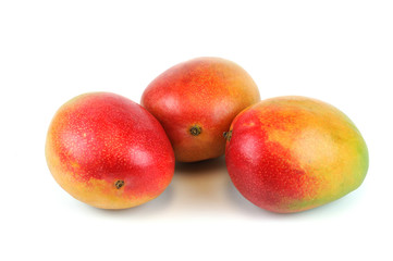 fresh mangoes on white background