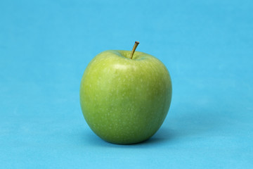 Apple on blue background