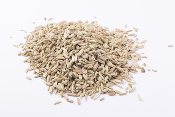 fennel seeds on white background