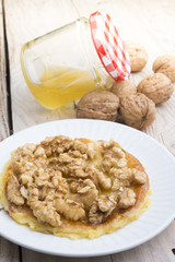 Pancakes with walnut and caramel for a breakfast