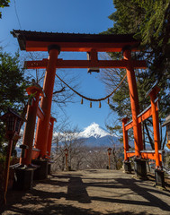 Fototapeta na wymiar view of fuji mountain frame in Torii Japanese tradition gate fro