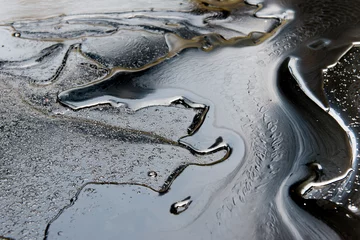 Fotobehang crude oil surface textured © anankkml