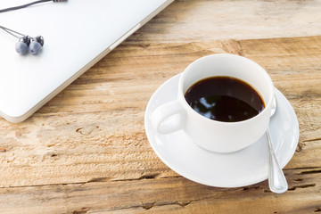 Obraz premium coffee cup on wood table. modern office desktop