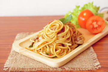 Stir-fried spicy spaghetti with chicken. Thai style