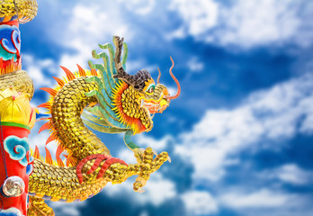 Fototapeta na wymiar Chinese style dragon statue and sky.