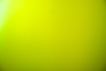 Green gradient blur rays lights abstract background.