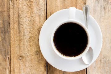 coffee cup on wood table.