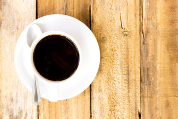 coffee cup on wood table. top view