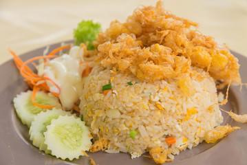 Egg Fried Rice with omelet on table