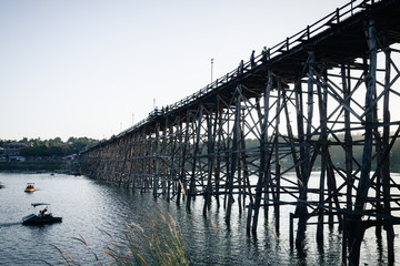 Utamanusorn Bridge (Mon Bridge), made from wooden for across the