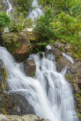 Fototapeta na wymiar Waterfall in deep rain forest jungle (Krok E Dok Waterfall Sarab