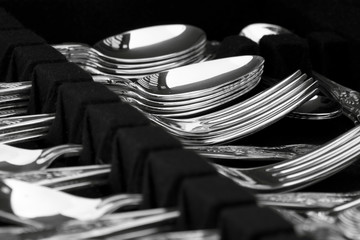 Antique cutlery / A canteen of antique silver cutlery on display.
