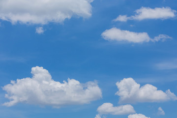 Naklejka na ściany i meble fluffy cloud on clear blue sky background