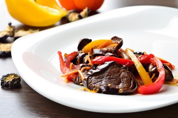 appetizer of dried eggplant, peppers, carrots.