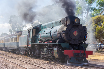 Naklejka premium A restored steam engine Locomotive still journeys in outback South Australia