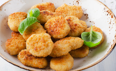 Chicken nuggets in a bowl.