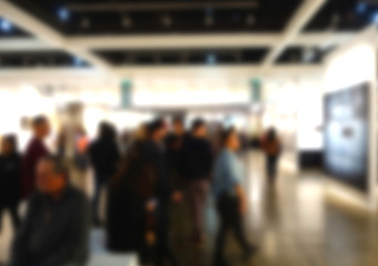 blur background of people at art gallery