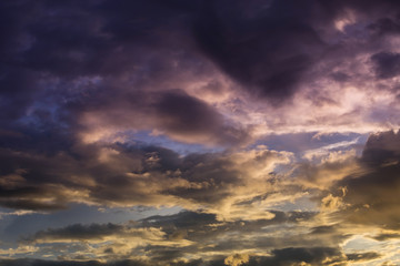 Naklejka na ściany i meble dark sunset sky and glowing cloud, twilight sky before rain