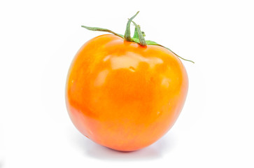 fresh red-yellow tomato on white background.