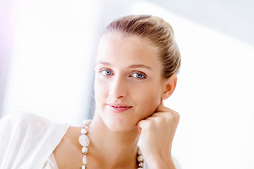 Attractive office worker sitting at desk