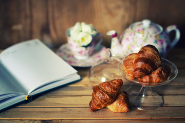 tea cup croissant book