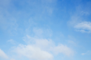 fluffy cloud above blue sky background