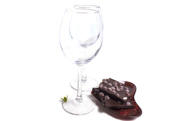 two glasses near a plate with chocolate © oksanastepanova