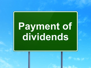 Money concept: Payment Of Dividends on road sign background