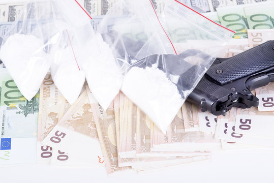 drugs,money,cocaine and gun