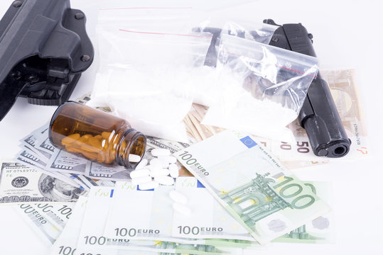 drugs,money,cocaine and gun