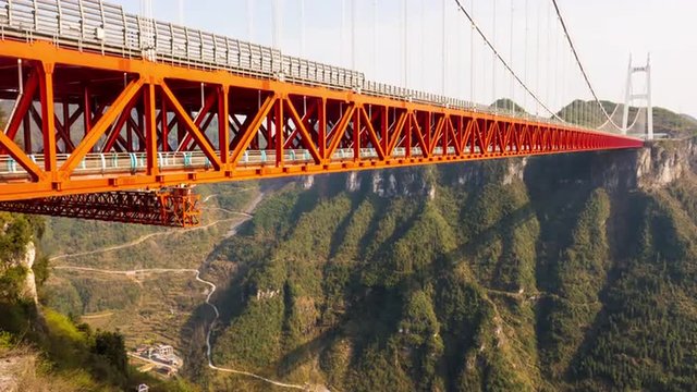 Aizhai Bridge 矮寨特大桥 Jishou,Hunan,China , 1102 ft/ 336 meters high,3858 ft/ 1176 meters span, Aizhai Bridge is the world&rsquo;s highest and longest tunnel to tunnel bridge.