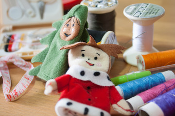 Handmade Christmas doll finger for Christmas gift on wood backgr