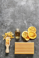 Spa set: sea salt, essential oil, bar of soap and dried oranges