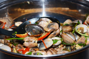 fried  sea shell with sweet basil and curry